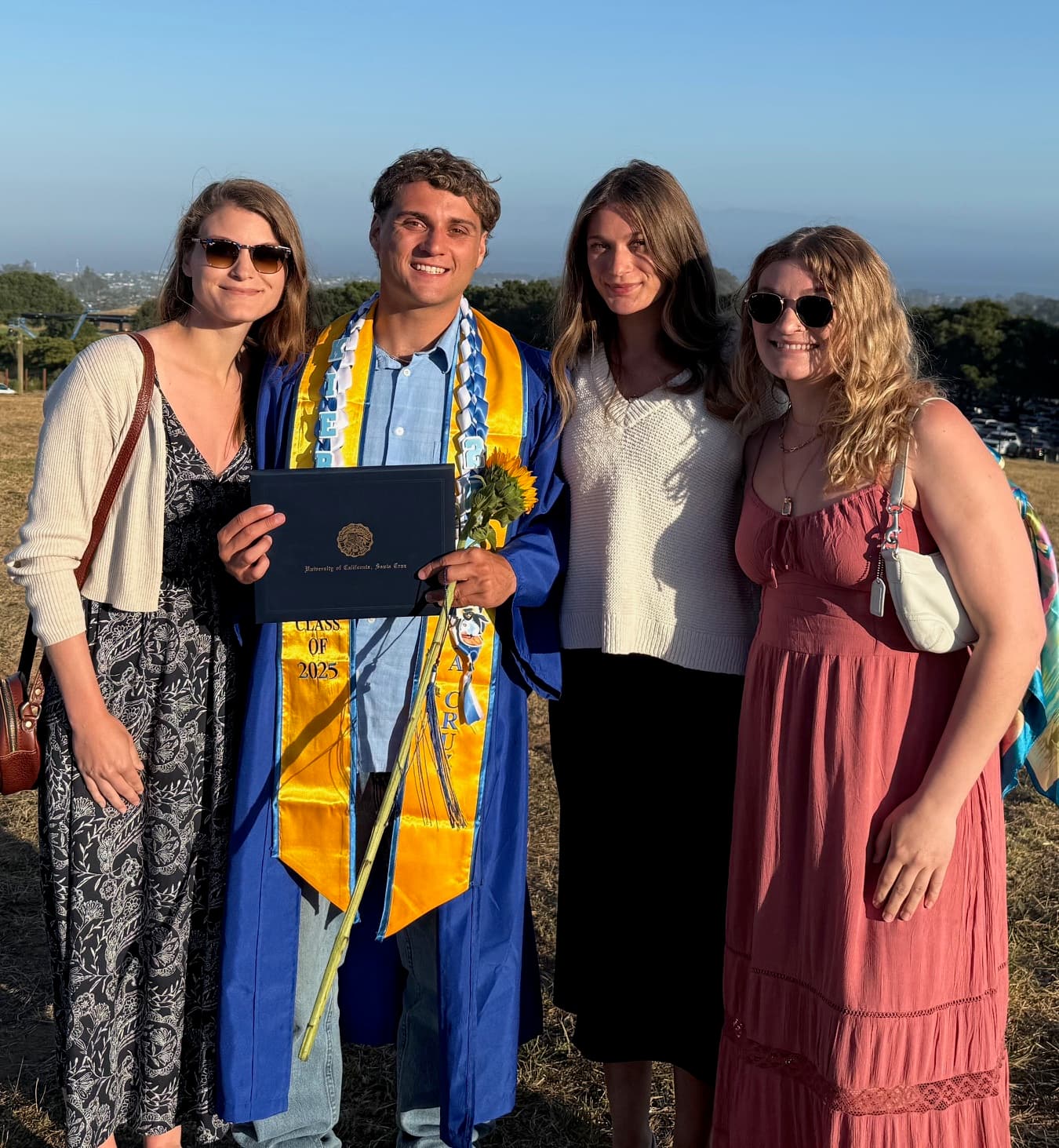 Kieran in Deathvalley riding on a Toyota Corolla somewhere on a dirt road.